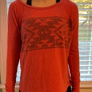 A long sleeve light sweater